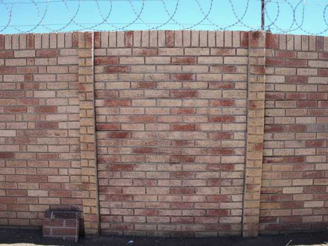 Sandstone Beige face brick style precast concrete wall panel.